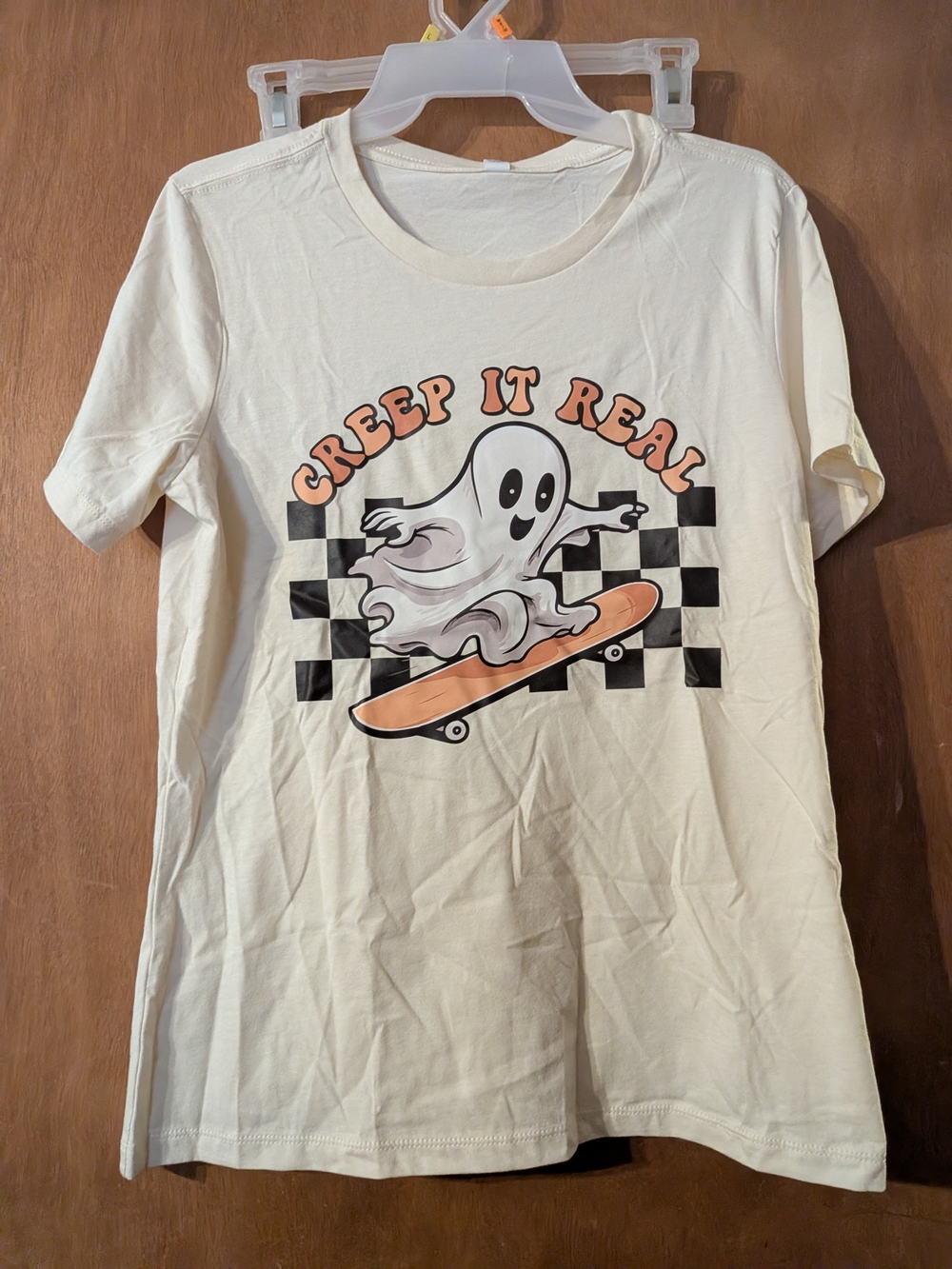 Bella Canvas Cream Women's Tee with Ghost Skate Graphic